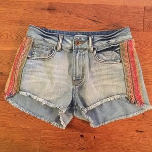 Jean shorts with Aztec design on the side